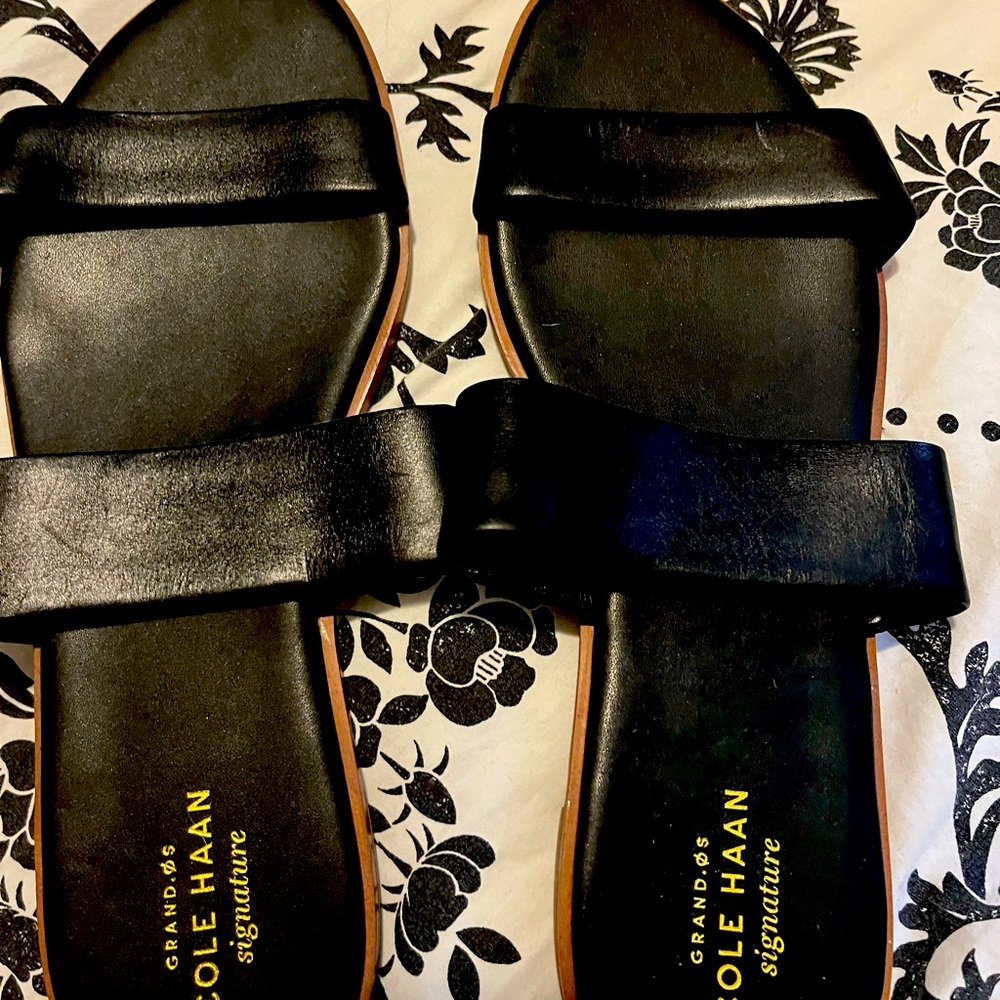 Black Cole Haan slip on sandals